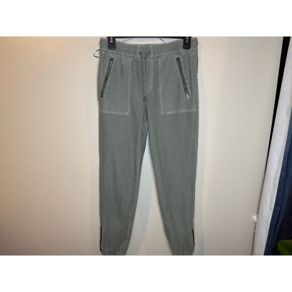 2/$35 ATHLETA Farallon Joggers 2 Pant Sage Green Casual Activewear Ankle Zip - Picture 1 of 7